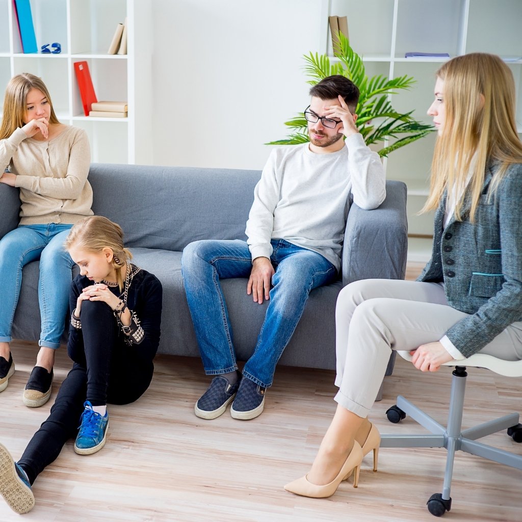 A warm family in a supportive counselling setting