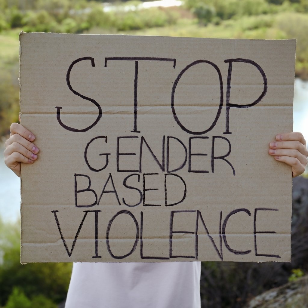 A person in a quiet moment of reflection — partner violence survivor support